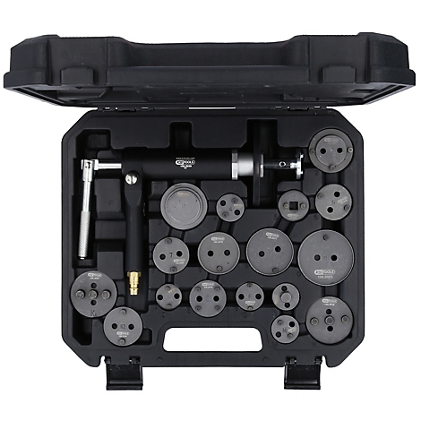 Schwarzer Werkzeugkoffer mit Bremskolben-Rückstellwerkzeug und diversen Aufsätzen. Der Koffer ist geöffnet.